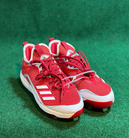 Red and white metal baseball cleats on sale